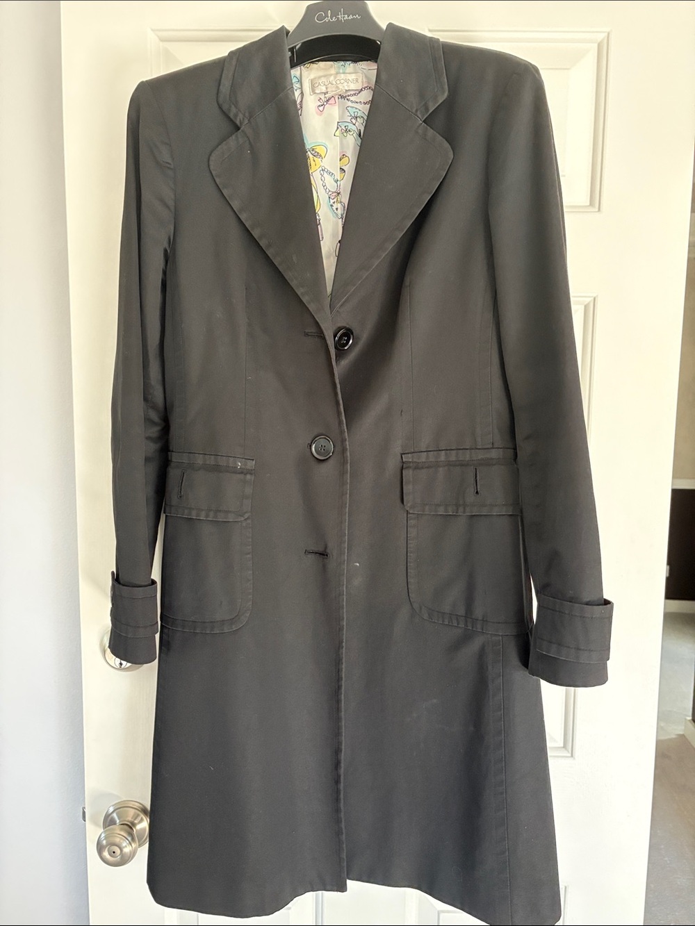 Women’s Black lightweight rain jacket with fun lining
